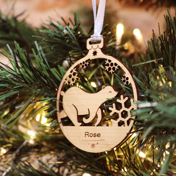Bolas y adornos de madera grabados y personalizados para el árbol de Navidad